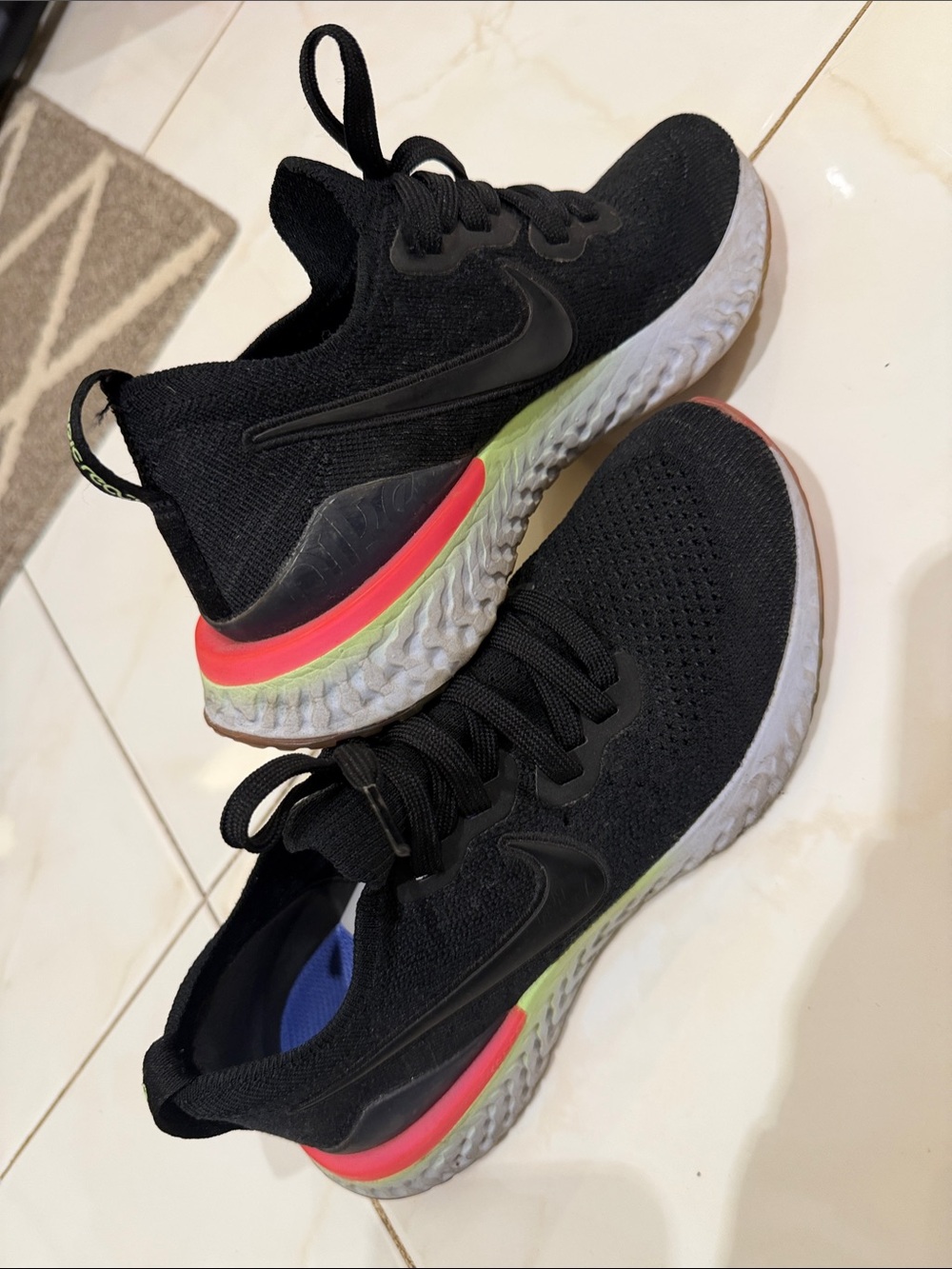 Nike Women’s Black Running Shoes with Pink and Lime Accents